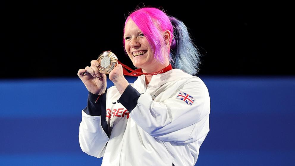 PHOTO: Bronze medalist Jodie Grinham of Great Britain celebrates on the podium at the 2024 Paris Paralympic Games, Aug. 31, 2024.