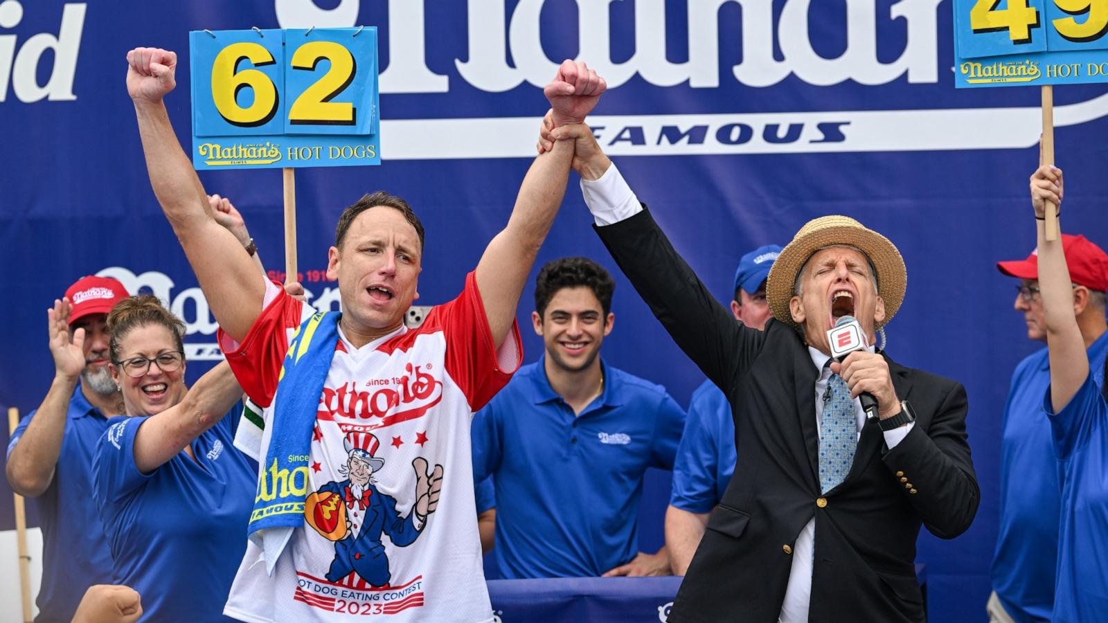 PHOTO: Defending champion Joey Chestnut cheers after finishing in first place in the 2023 Nathan's Famous Fourth of July International Hot Dog Eating Contest in Coney Island, NY, July 4, 2023.