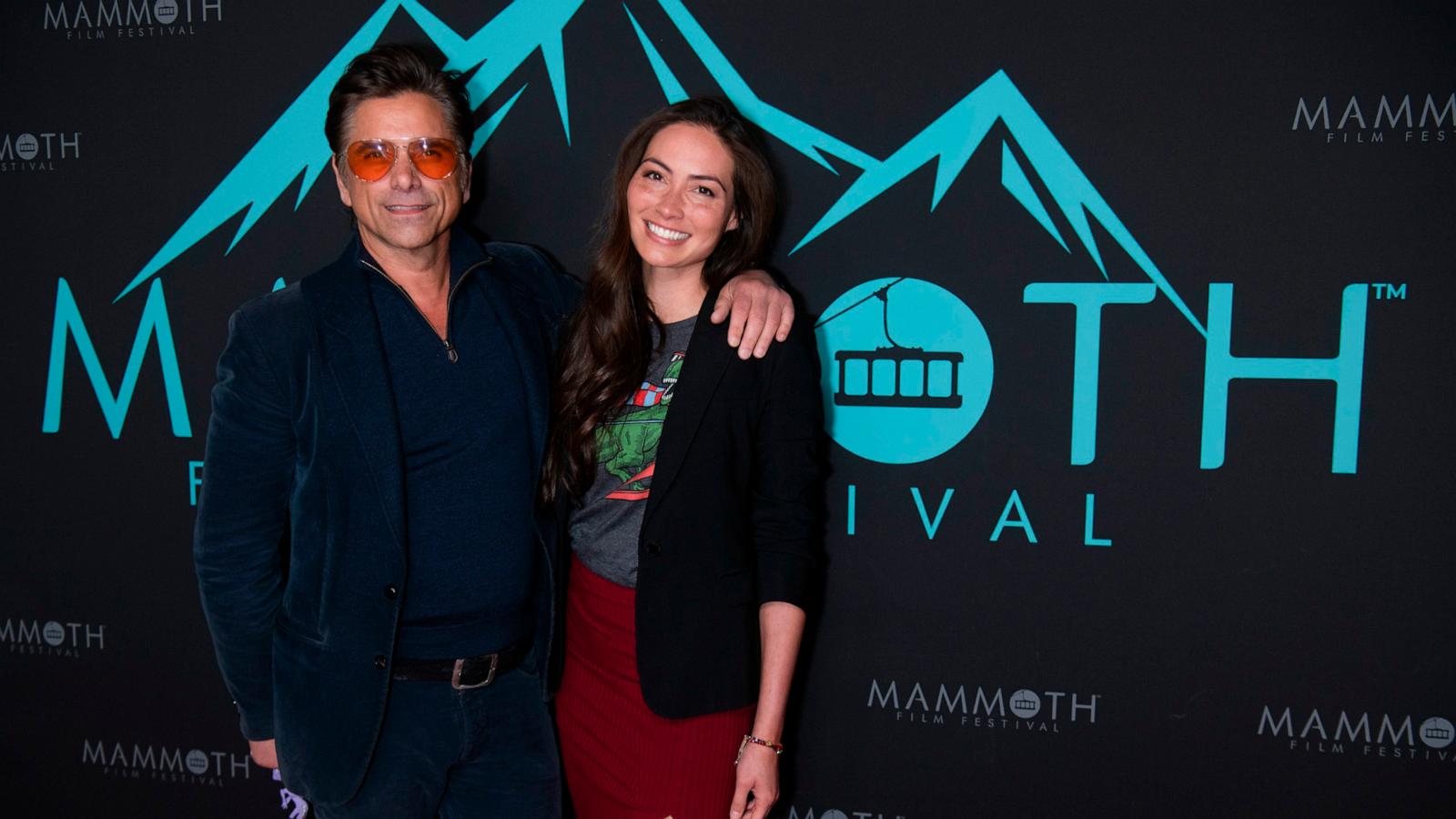 PHOTO: John Stamos and Caitlin McHugh Stamos arrive at Mammoth Film Festival Premieres in Mammoth, CA, Mar. 01, 2024.