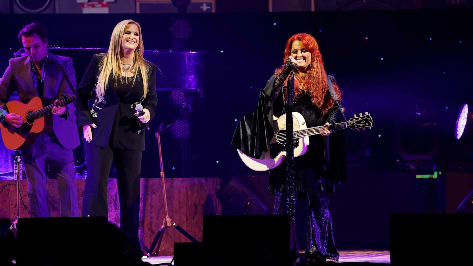 PHOTO: Trisha Yearwood and Wynonna Judd perform onstage during The Judds: The Final Tour at Bridgestone Arena, Oct. 28, 2022, in Nashville, Tenn.