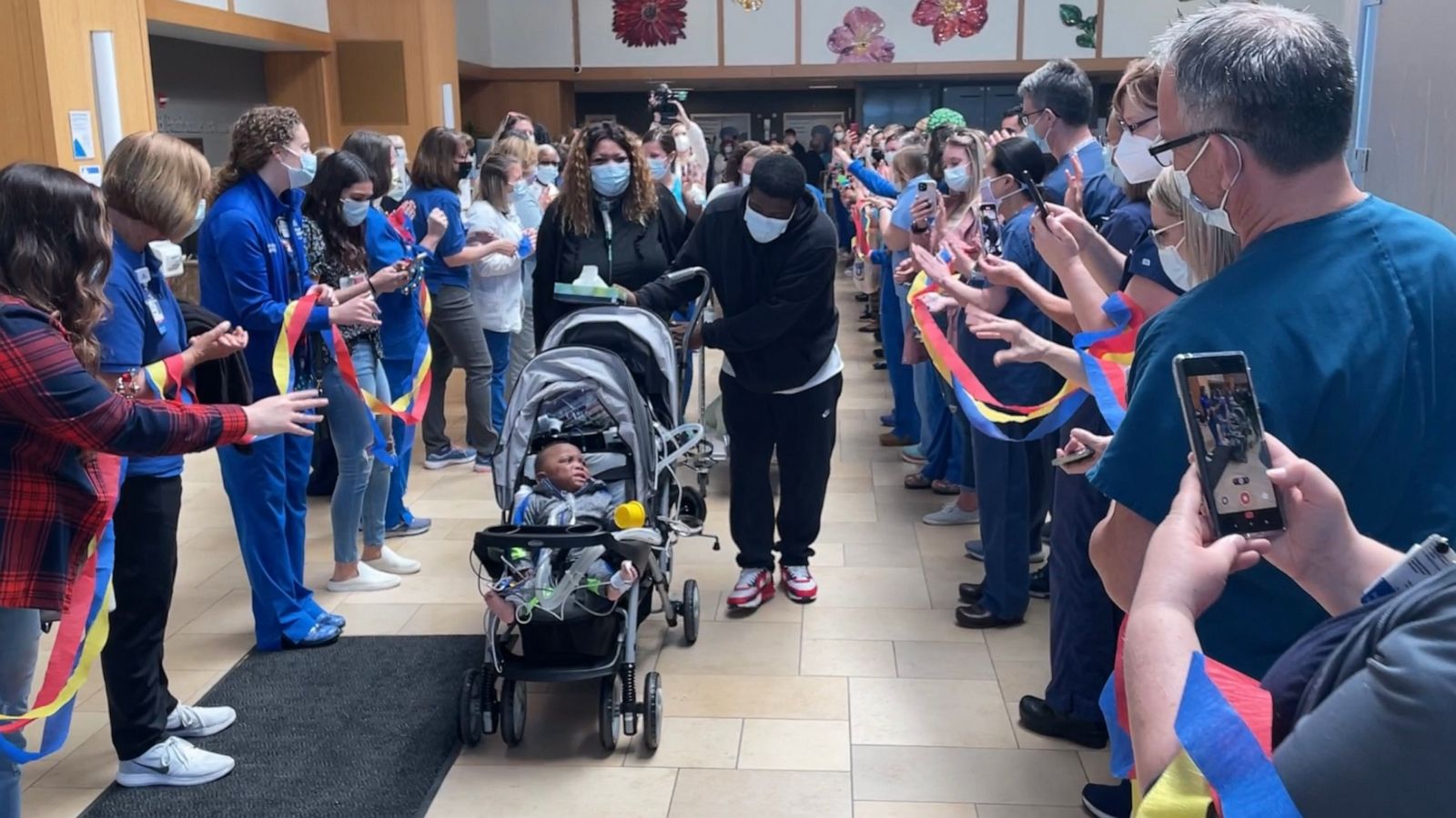 PHOTO: Ascension St Vincent Women's Hospital staff held a cheer parade for Kendall Jurnakins and his family when he was discharged on March 16.