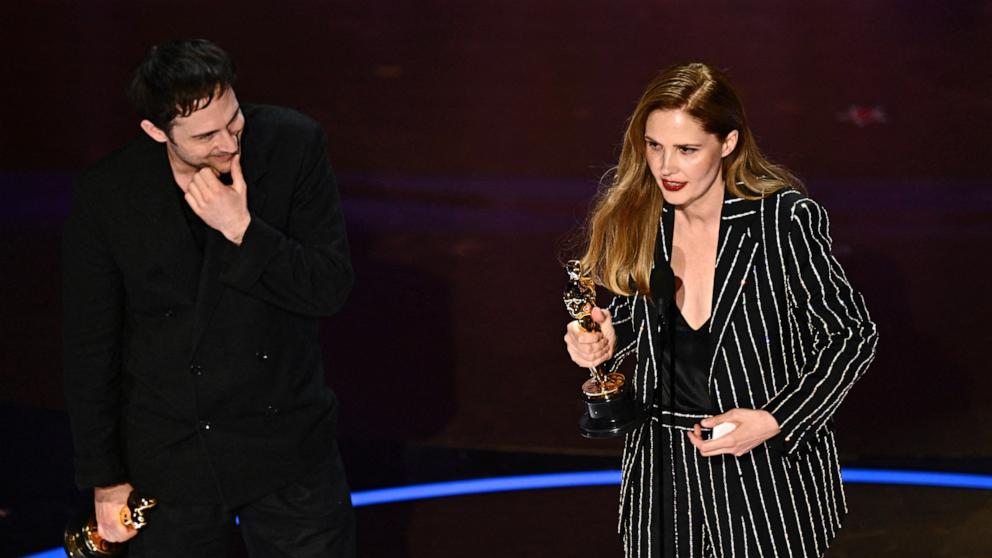 PHOTO: Justine Triet and Arthur Harari accept the award for Best Original Screenplay for "Anatomy of a Fall" during the 96th Annual Academy Awards in Hollywood, CA, March 10, 2024. 