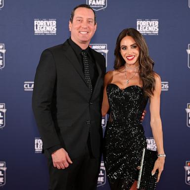 PHOTO: NASCAR Cup Series driver, Kyle Busch and wife, Samantha Busch pose for photos on the red carpet prior to the NASCAR Hall of Fame Induction Ceremony at Charlotte Convention Center on January 23, 2026 in Charlotte, North Carolina. 