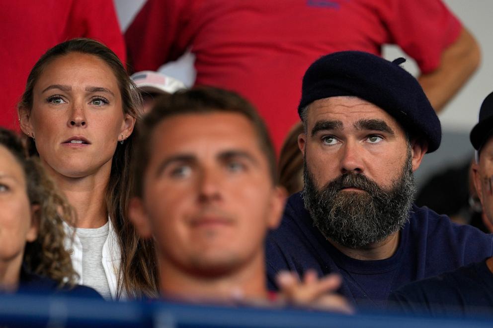 PHOTO: Recently retired Philadelphia Eagles lineman Jason Kelce and wife Kylie watch the women's field hockey match between the Argentina and United States, at the Yves-du-Manoir Stadium, at the 2024 Summer Olympics, July 27, 2024, in Colombes, France.