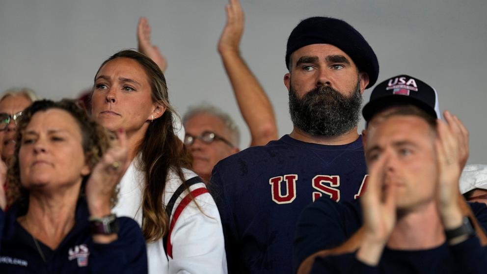 PHOTO: Recently retired Philadelphia Eagles lineman Jason Kelce and wife Kylie watch the women's field hockey match between the Argentina and United States, at the Yves-du-Manoir Stadium, at the 2024 Summer Olympics, July 27, 2024, in Colombes, France.