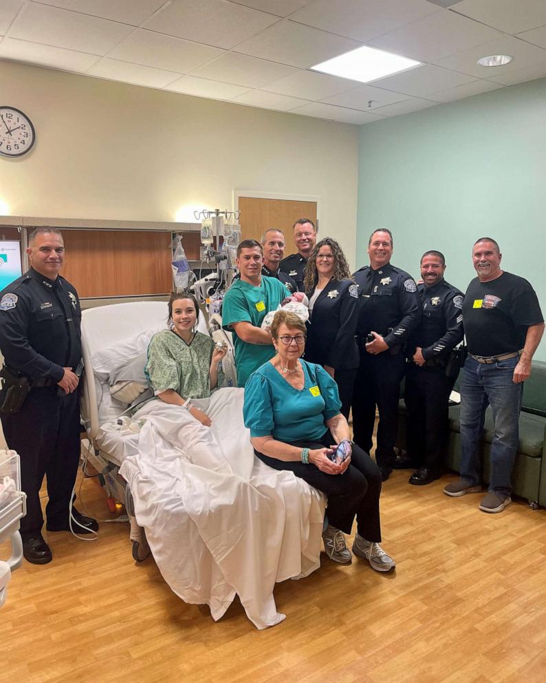 PHOTO: Trent Kersey was sworn in as a police officer on Oct. 31, 2023, about an hour after his second son, Theo, was born at Memorial Medical Center.