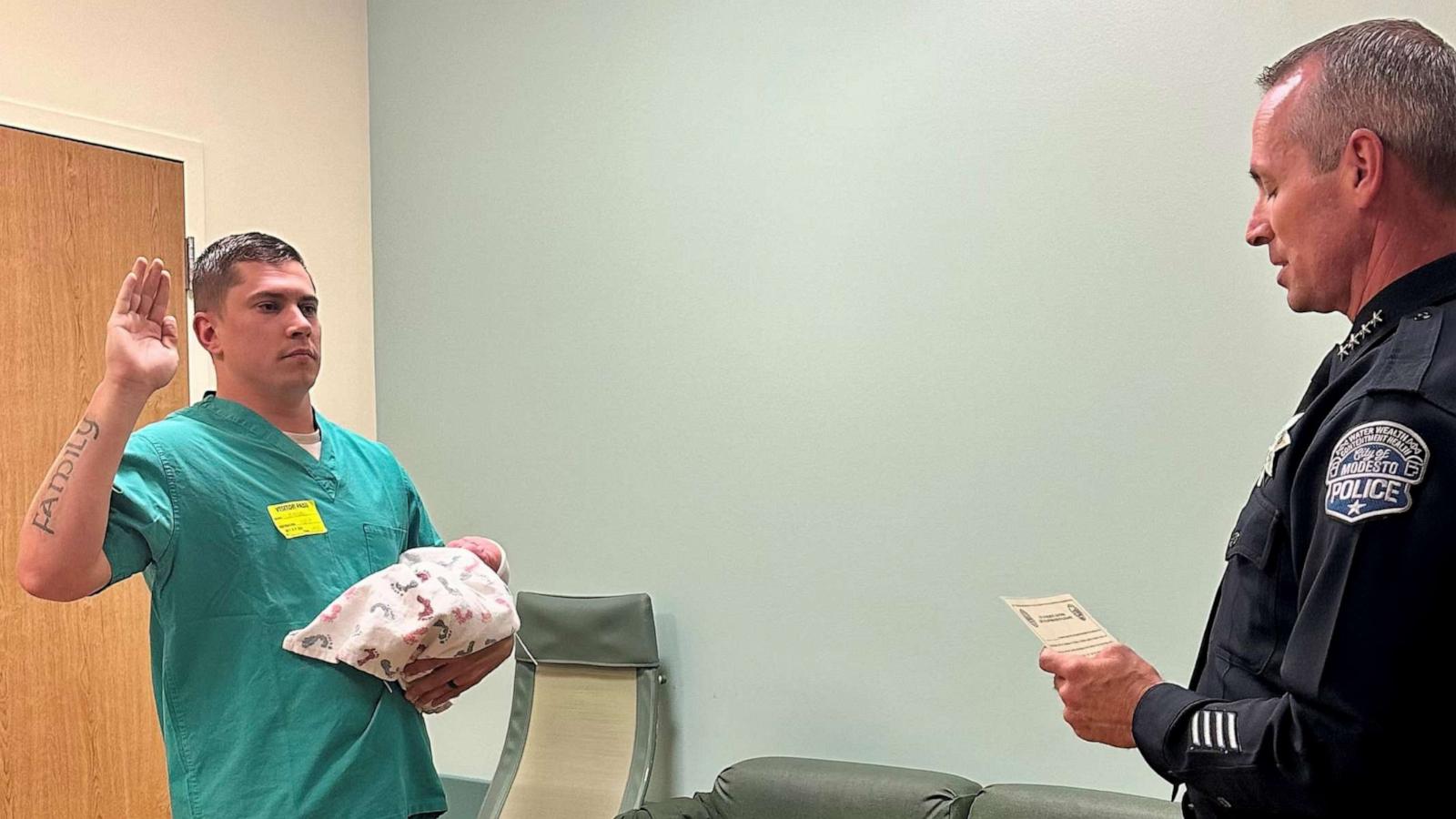 PHOTO: Trent Kersey was sworn in as a Modesto police officer on Oct. 31, 2023 while holding his newborn son Theo in his arm.