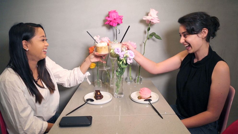 PHOTO: Angeline Bernabe and Faith Bernstein enjoying drinks at LROOM Cafe. 
