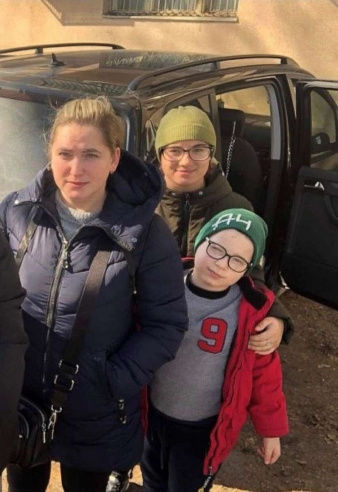 PHOTO: The 16-year-old girl being adopted by Kelly and Kevin Lee poses with her sister and nephew as they left Ukraine in March 2022.
