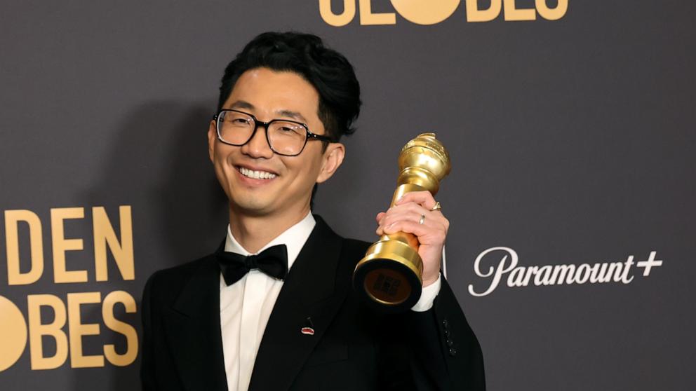 PHOTO: Lee Sung Jin, winner of the Limited Series, Anthology Series, or Motion Picture Made for Television award for "Beef", poses in the press room during the 81st Annual Golden Globe Awards, on Jan. 7, 2024, in Beverly Hills, California. 