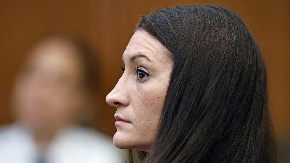 PHOTO: Lindsay Clancy, who is accused of killing her three young children in 2023, listens to a witness on video during her Plymouth Superior Court trial in Plymouth, Massachusetts, August 24, 2026.