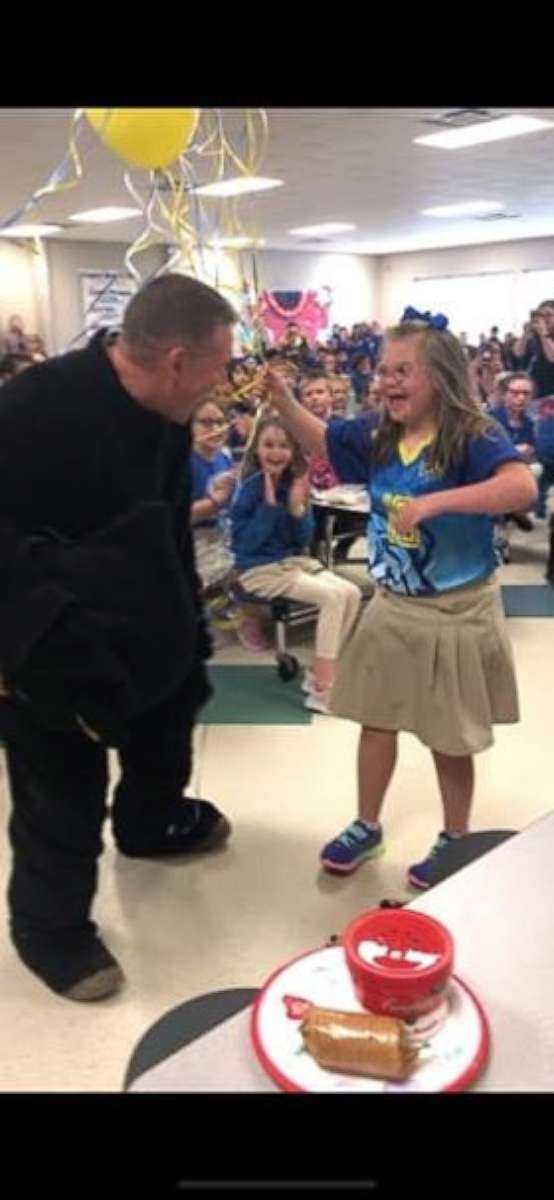 PHOTO: Keith Cowell surprised his daughter Kindle at school after returning from Afghanistan. 