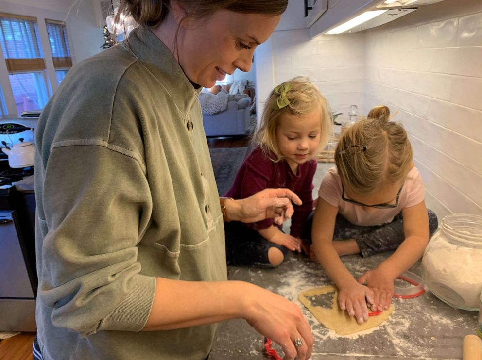 PHOTO: Mansfield is pictured baking with two of her daughters.