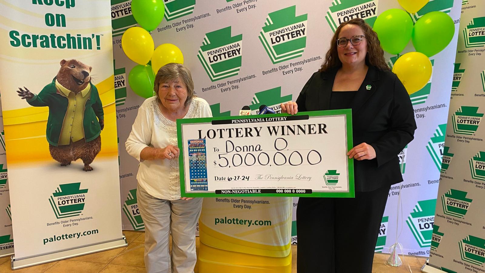 PHOTO: Lottery winner Donna Osborne, left, poses with Staci Coombs, deputy director of corporate sales for the Pennsylvania Lottery.