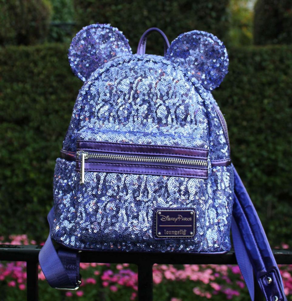 PHOTO: The Loungefly Potion Purple Mini Backpack features a glamorous sequined design and Minnie ears with her signature bow.