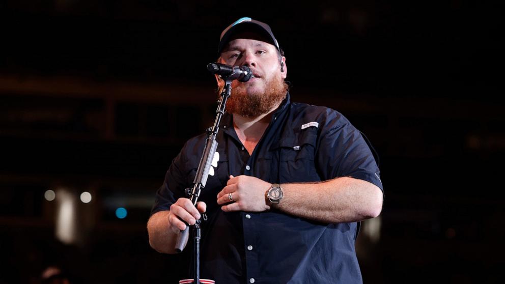 PHOTO: Luke Combs performs onstage at the Concert For Carolina Benefit Concert at Bank of America Stadium, Oct. 26, 2024, in Charlotte, N.C.