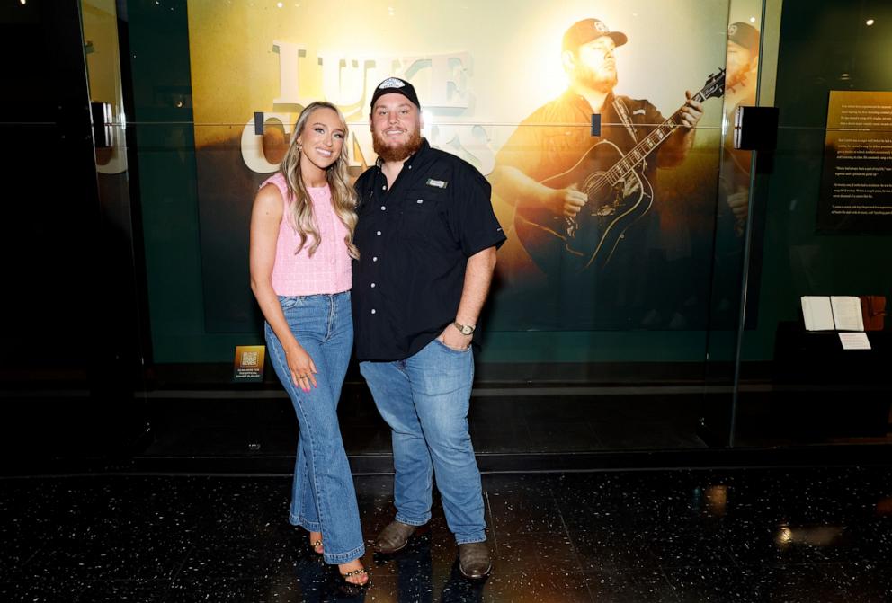 PHOTO: Nicole Combs, left, and Luke Combs attend the new exhibit "Luke Combs: The Man I Am" at the Country Music Hall of Fame and Museum, July 10, 2024, in Nashville.