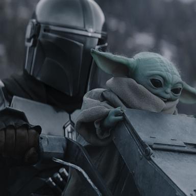 PHOTO: The Mandalorian and Grogu in Lucasfilm's "The Mandalorian and Grogu." 