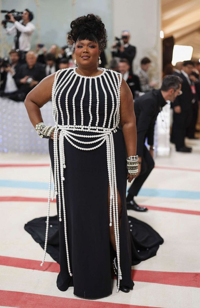PHOTO: Lizzo poses at the Met Gala, an annual fundraising gala held for the benefit of the Metropolitan Museum of Art's Costume Institute with this year's theme "Karl Lagerfeld: A Line of Beauty", in New York, May 1, 2023.