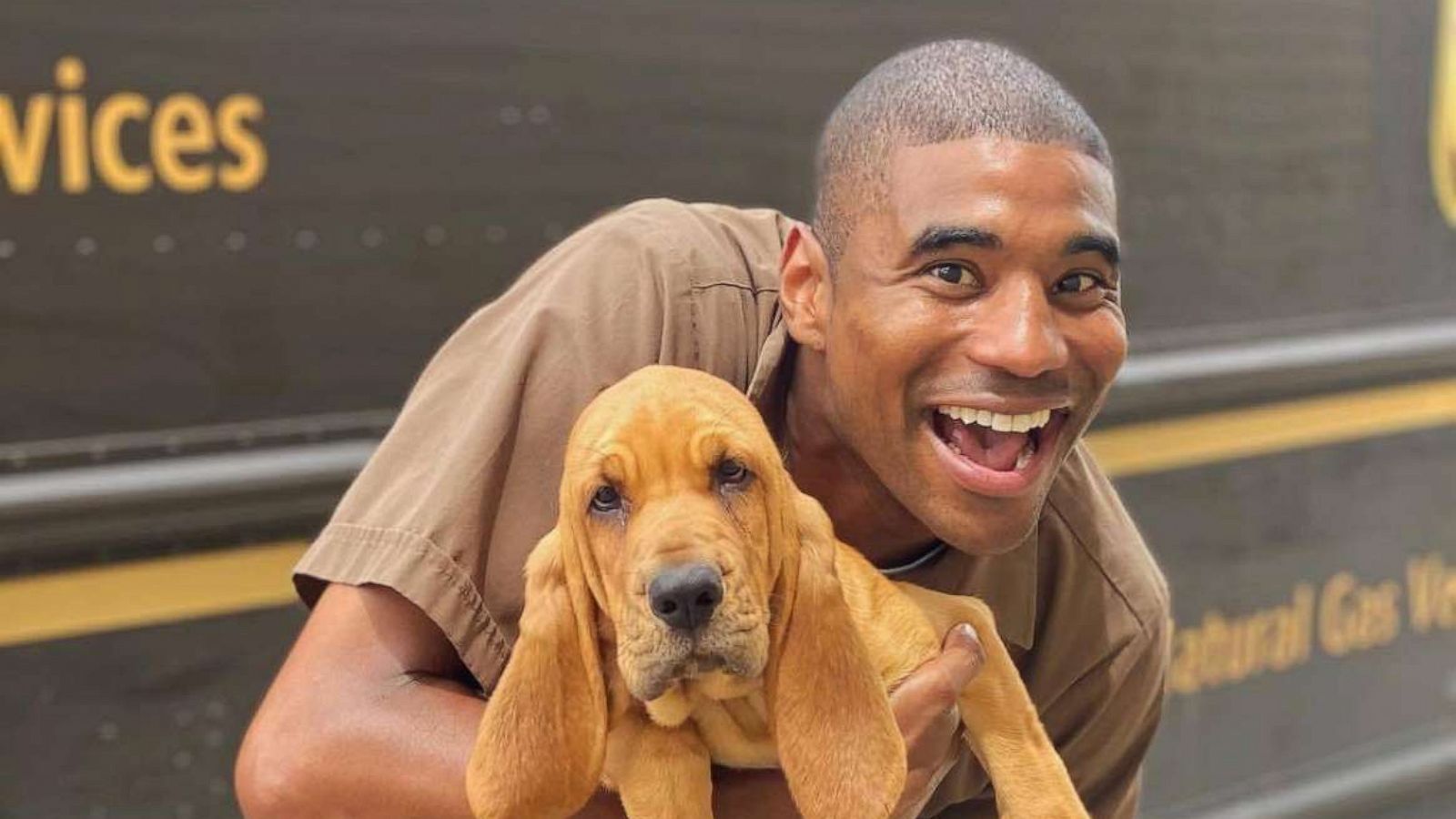 PHOTO: UPS driver Jason Hardesty loves to take photos with dogs he meets on his routes.