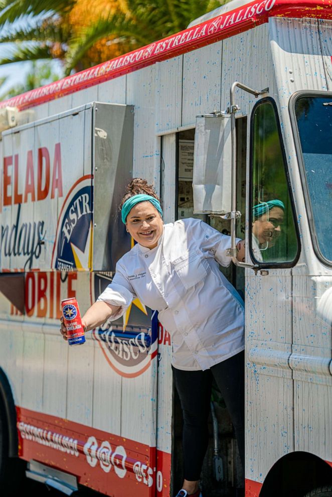 PHOTO: Chef Maria Mazon with a classic micheladda on the Estrella Jalisco food truck.