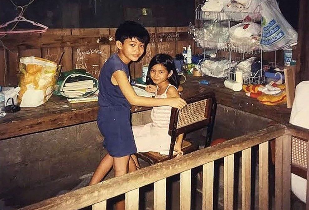 PHOTO: A young Maria Cielito Robles with her brother Carlito Robles at home in the Philippines. Maria Cielito Robles immigrated to the U.S. when she was 8 years old.