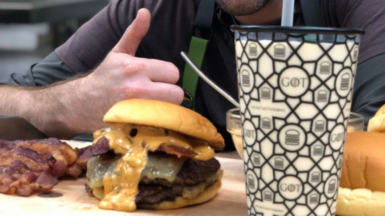 PHOTO: Culinary director Mark Rosati with the new Dracarys burger and Dragonglass milkshake at Shake Shack innovation kitchen in New York City.