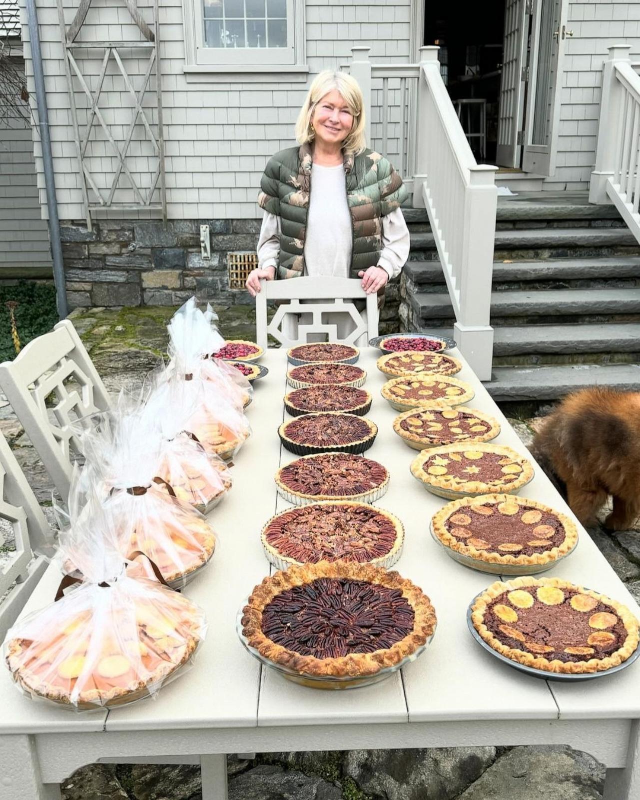 PHOTO: Martha Stewart stands at a table with her 30 assorted homemade Thanksgiving pies.