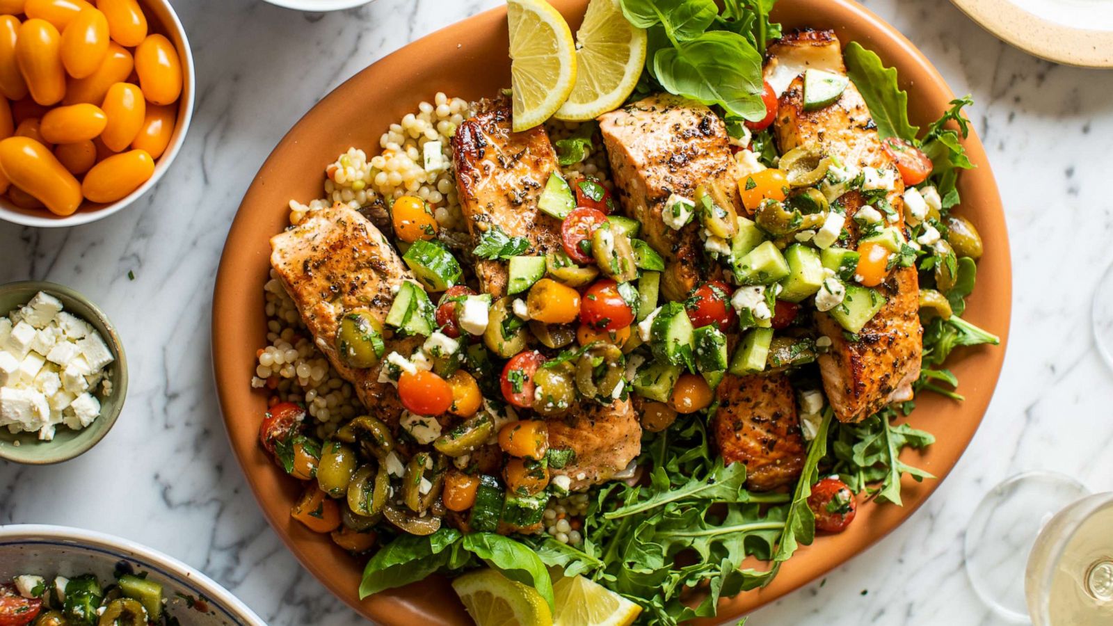 PHOTO: Mediterranean salmon with a simple, fresh salad topper.