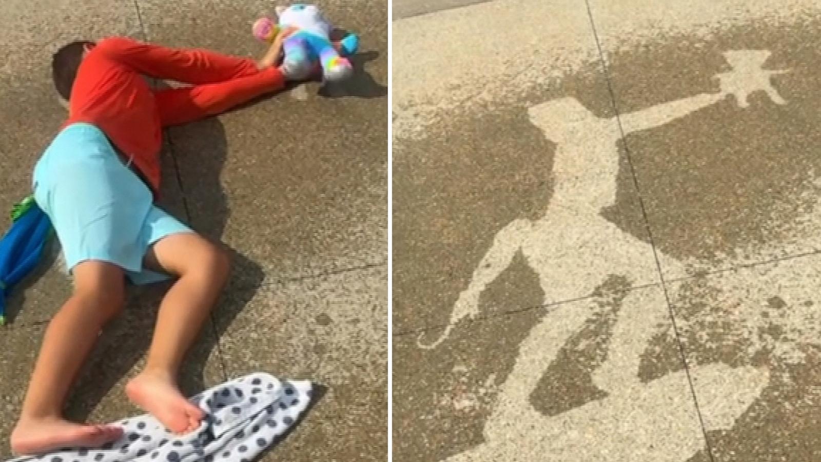 PHOTO: Megan Baird and her sons Carter and Parker enjoy making "water silhouettes" on their driveway, creating images by making poses on their home driveway and then spraying water with a garden hose to outline them.