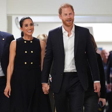 Britain's Prince Harry (R), Duke of Sussex, and his wife Meghan (L), the Duchess of Sussex in Melbourne on April 14, 2026.