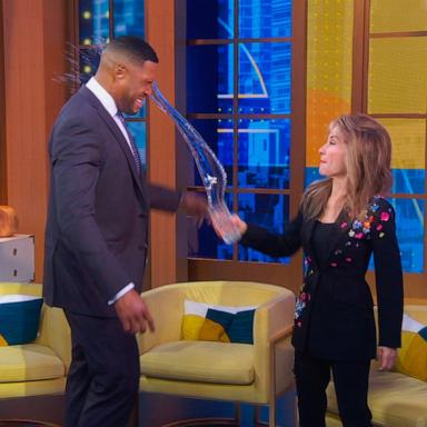 PHOTO: Actress Susan Lucci tosses a glass of water on host Michael Strahan on Good Morning America, Feb. 24, 2024.