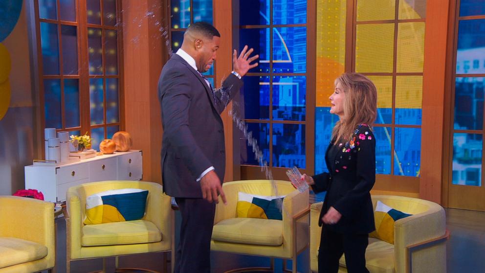 PHOTO: Actress Susan Lucci tosses a glass of water on host Michael Strahan on Good Morning America, Feb. 24, 2024.