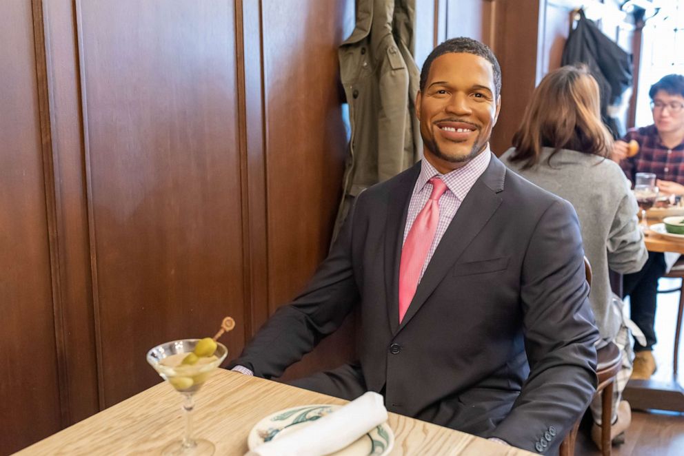 PHOTO: A wax statue of Michael Strahan from Madame Tussauds inside Peter Luger Steak House.