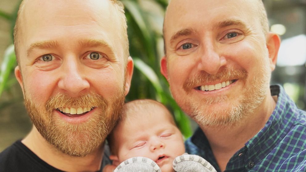 PHOTO: Michael Stribling, 37, pictured with Brian Ritter, 46, and their daughter Ella.