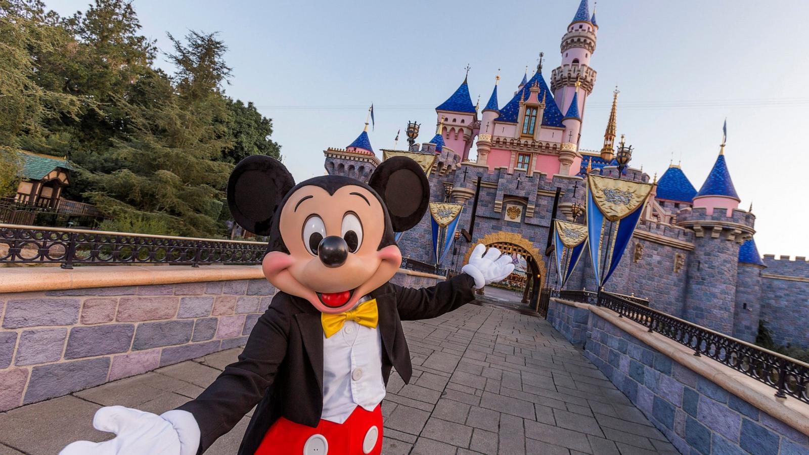 Mickey Mouse poses in front of Sleeping Beauty Castle at Disneyland Park on August 27, 2019 in Anaheim, California.