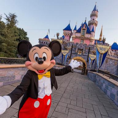Mickey Mouse poses in front of Sleeping Beauty Castle at Disneyland Park on August 27, 2019 in Anaheim, California.