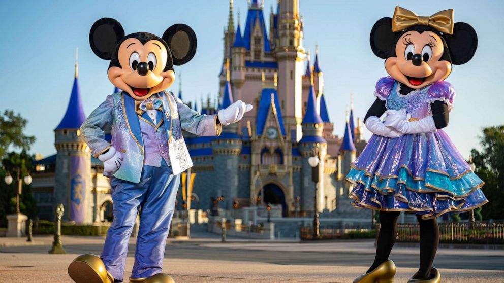 PHOTO: Mickey and Minnie Mouse show off their new outfits for Walt Disney World's 50th anniversary.