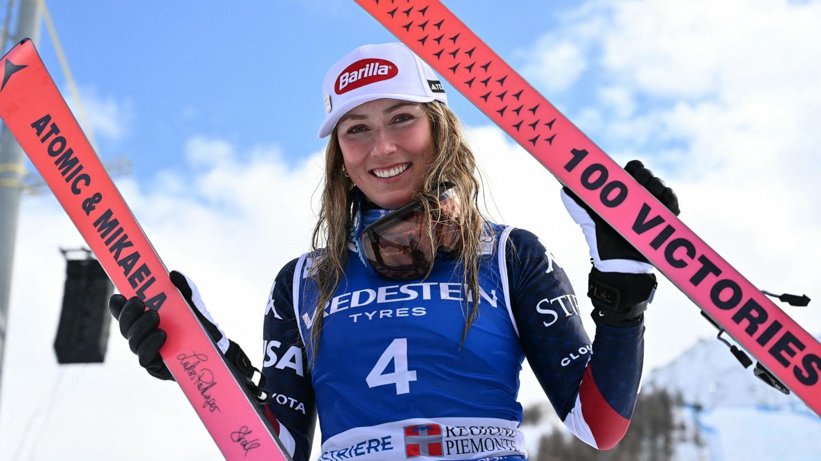 PHOTO: Mikaela Shiffrin poses with skis marking her "100 Victories" after winning the Women's Slalom event during the FIS Alpine Skiing World Cup, Feb. 23, 2025, in Sestriere, Italy.