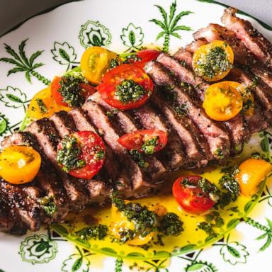 PHOTO: A New York strip steak with summer tomatoes.
