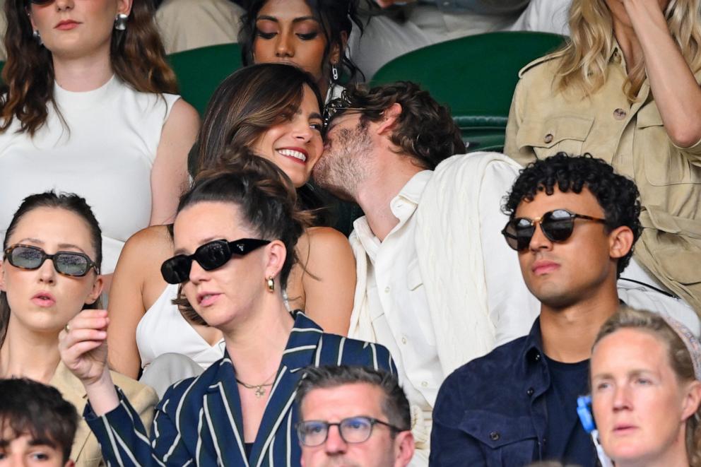 PHOTO: Monica Barbaro and Andrew Garfield attend day seven of the Wimbledon Tennis Championships, July 6, 2025 in London.