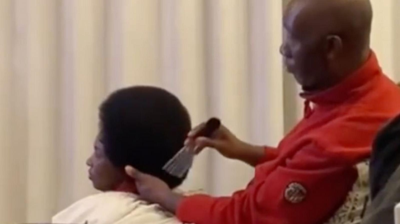 PHOTO: Jones Motivat tending to his wife Bea's hair.