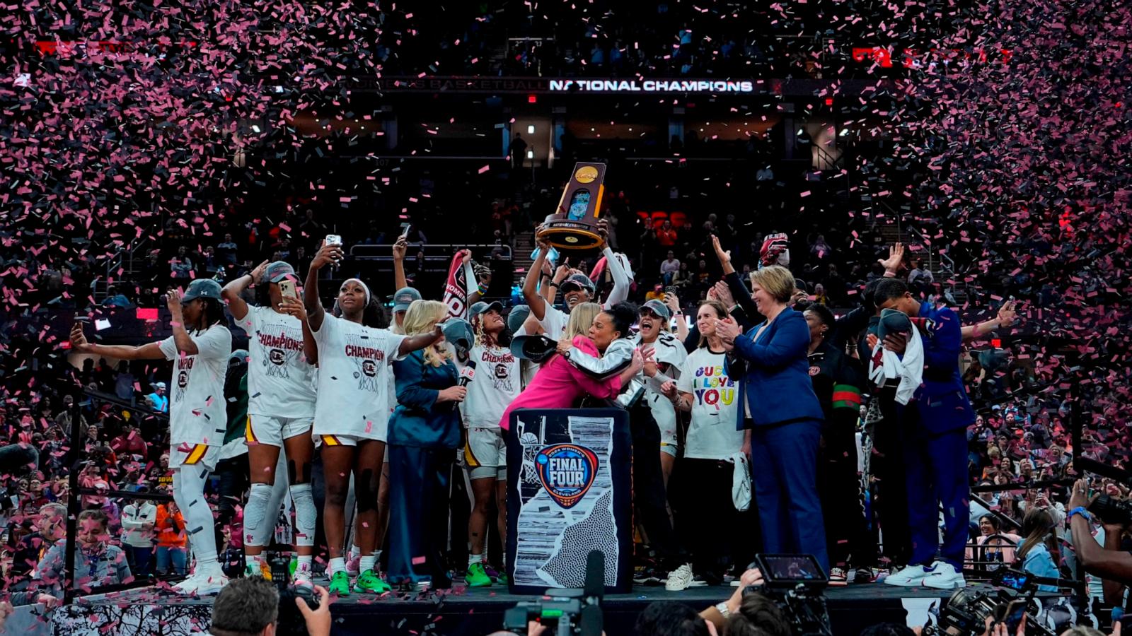 PHOTO: South Carolina players and coaches celebrate after the Final Four college basketball championship game against Iowa in the women's NCAA Tournament, Cleveland, OH, April 7, 2024.