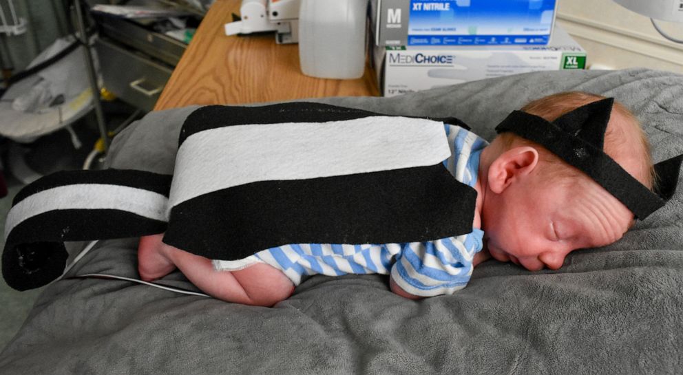 PHOTO: Baby from the Tallahassee Memorial HealthCare NICU dressed up in a skunk Halloween costume.