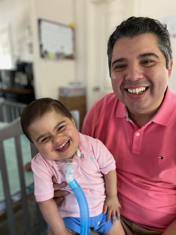 PHOTO: Nathaniel is all smiles with his father, Jorge Flores.