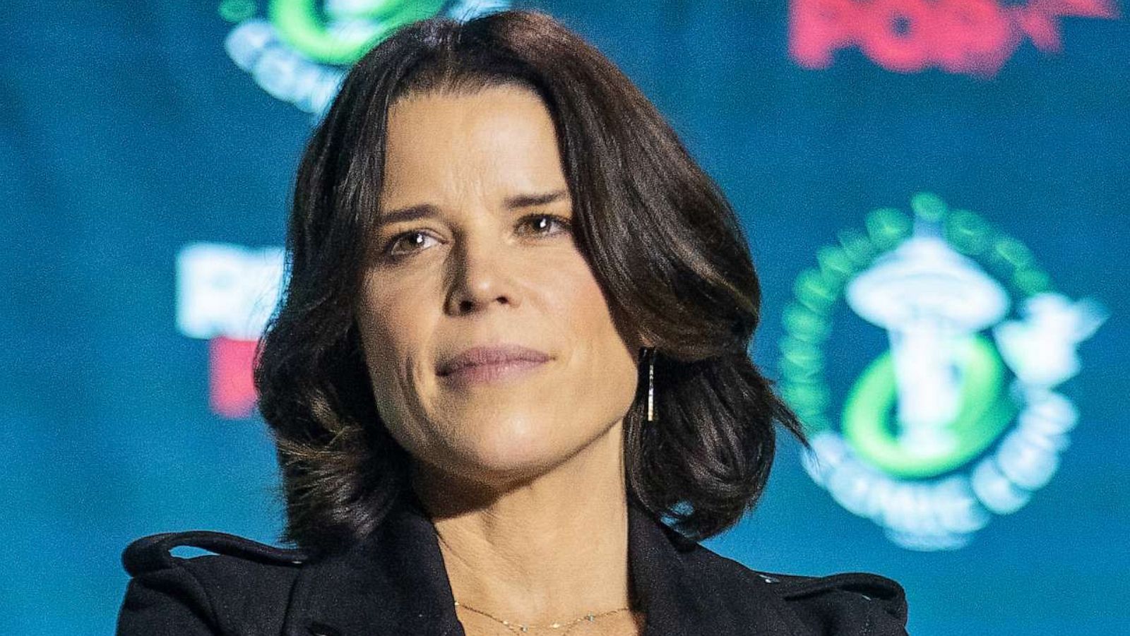 PHOTO: Neve Campbell speaks at the "What's Your Favorite Scary Movie? Scream Cast Reunion" during Emerald City Comic Con, Mar. 3, 2023 in Seattle.