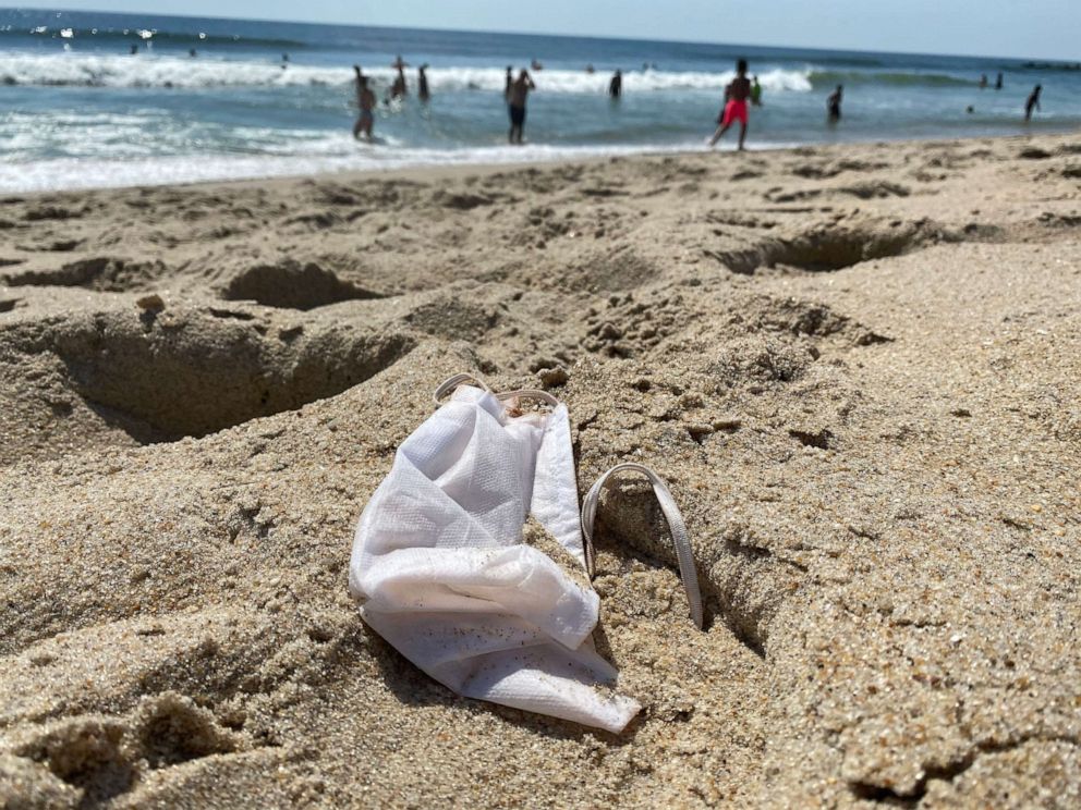 PHOTO: Face mask lies on a beach in New Jersey.