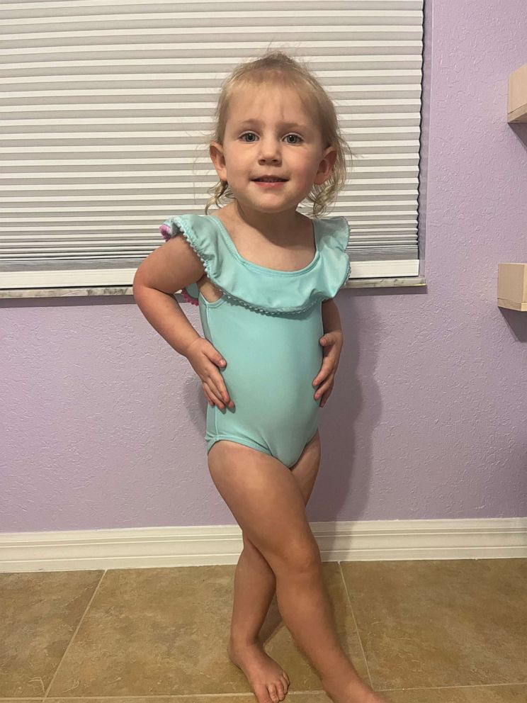 PHOTO: Claire models an example of a blue swimsuit that her mom Nikki Scarnati says parents should avoid when shopping for swimsuits for their children.