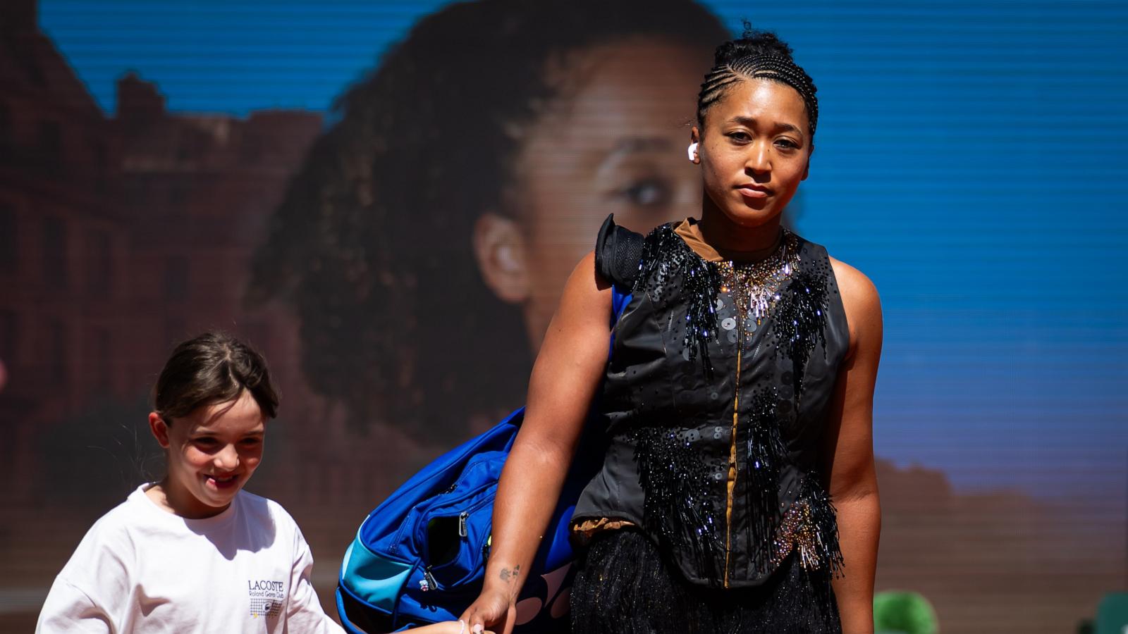 PHOTO: Naomi Osaka of Japan walks onto the court to play against Laura Siegemund of Germany in the first round on Day Three of the 2026 French Open at Roland Garros on May 26, 2026 in Paris, France.