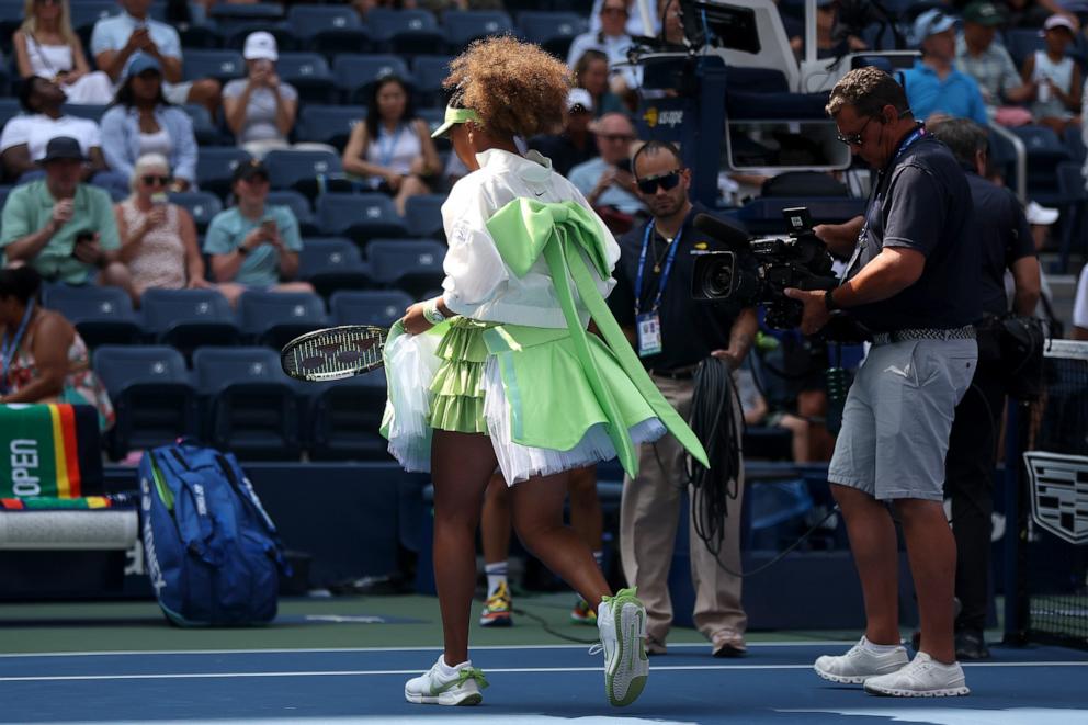 PHOTO: Naomi Osaka of Japan walks on court before playing against Jelena Ostapenko of Latvia during their Women's Singles First Round match on Day Two of the 2024 US Open at the USTA Billie Jean King National Tennis Center on Aug. 27, 2024 in NYC.